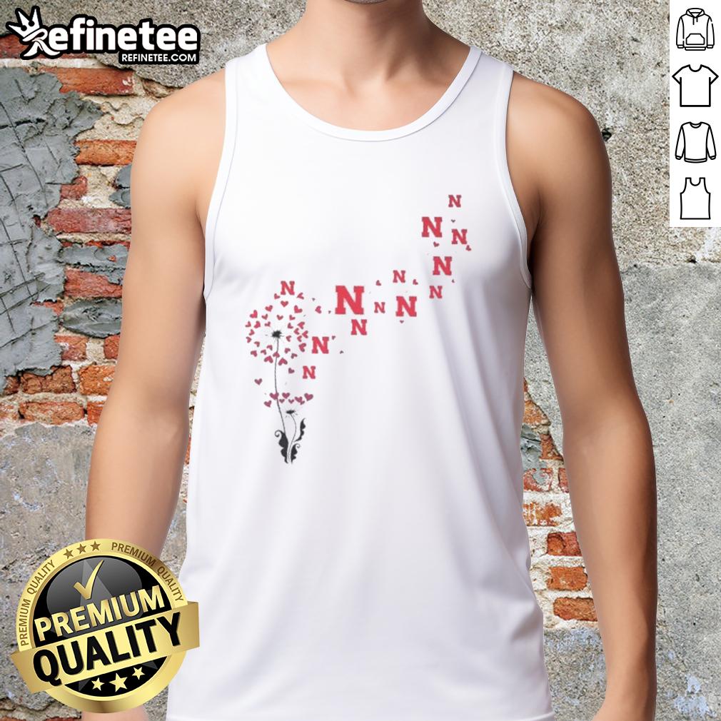 Pretty dandelion flower tank top featuring Nebraska Huskers football logo, perfect for game day or casual wear.