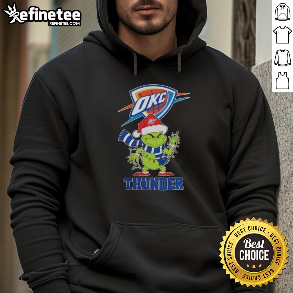 Oklahoma City Thunder holiday hoodie featuring Grinch design and Santa hat for festive fans.