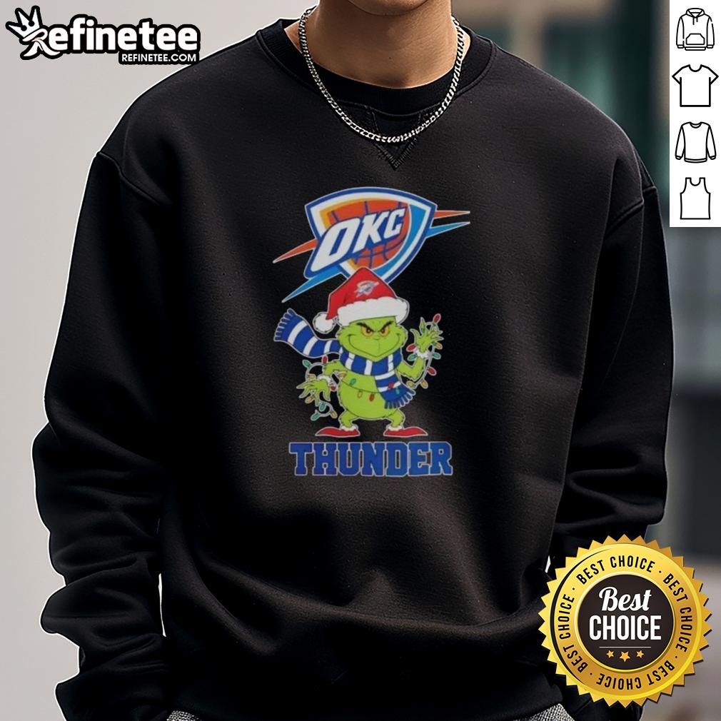 Alt Text: Oklahoma City Thunder Christmas sweatshirt featuring Grinch and Santa hat design, perfect for holiday cheer.