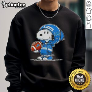 Snoopy wearing a Detroit Lions hoodie smiles at fans in a cozy Awesome Peanuts sweatshirt.