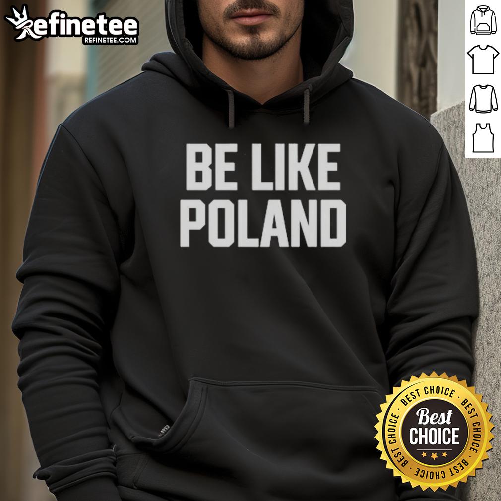 Man wearing a Hot Tommy Robinson Be Like Poland hoodie, showcasing a bold graphic and vibrant colors.
