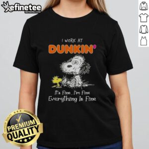 Alt Text: Official Tired Snoopy and Woodstock graphic on a Dunkin' Donuts ladies tee, featuring the phrase It's fine, I'm fine.