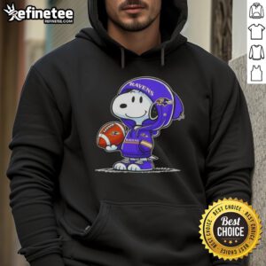 Snoopy in a hoodie smiling at fans, representing Premium Peanuts and Baltimore Ravens spirit.