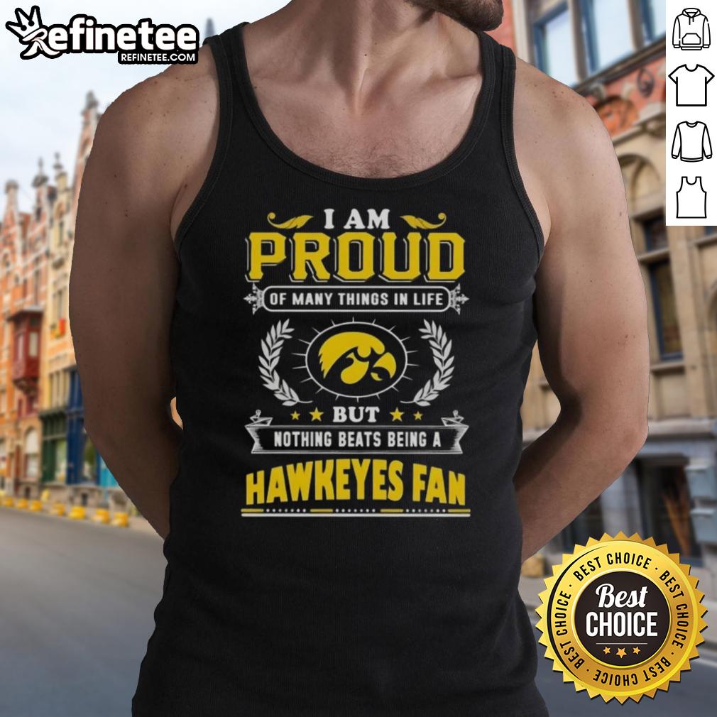 Iowa Hawkeyes fan wearing a tank top with the phrase 'I am proud of many things, but nothing beats being a Hawkeyes fan.'