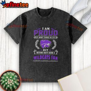 Alt Text: Kansas State Wildcats fan proudly wearing a washed T-shirt that says 'I am proud of many things in life.'