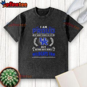Kentucky Wildcats fan proudly wearing a washed t-shirt with the phrase 'I am proud of many things in life'.