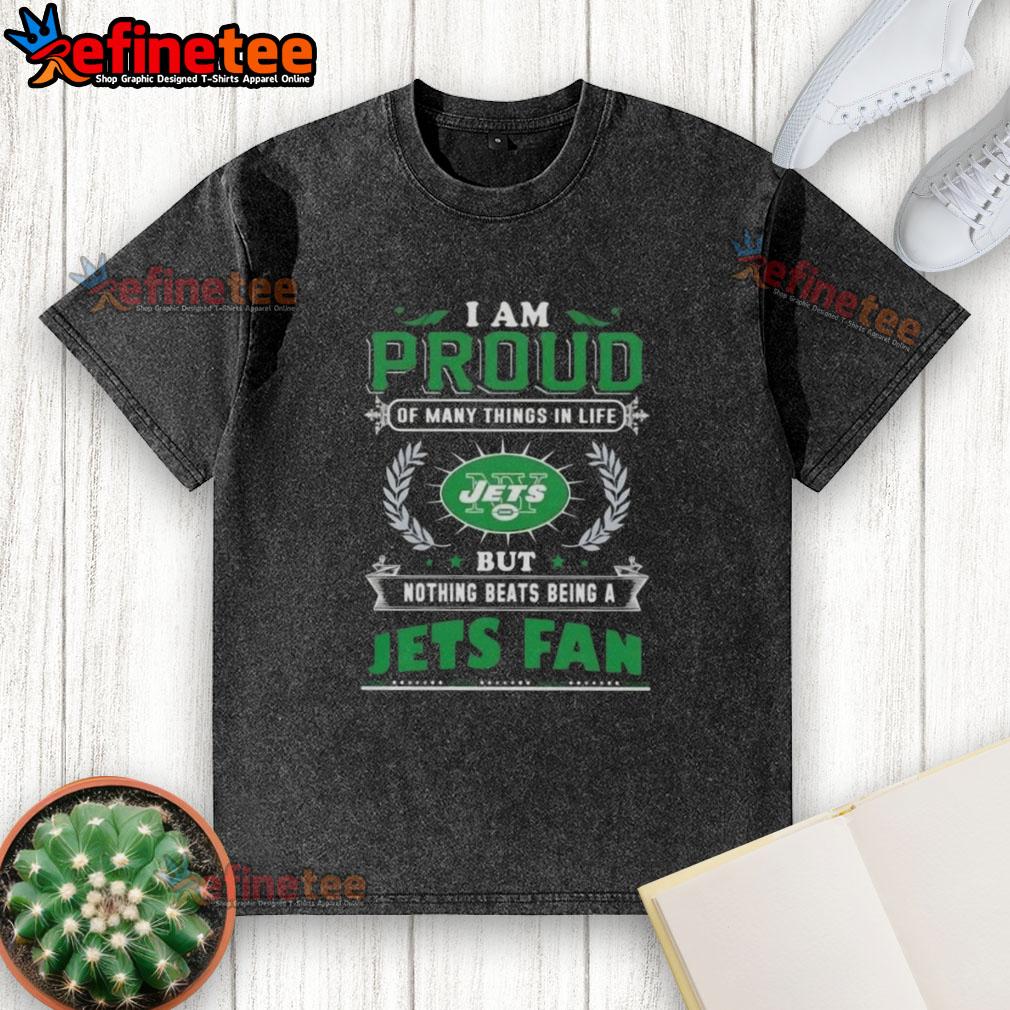 Proud New York Jets fan wearing a washed t-shirt showcasing their love for the team and football spirit.