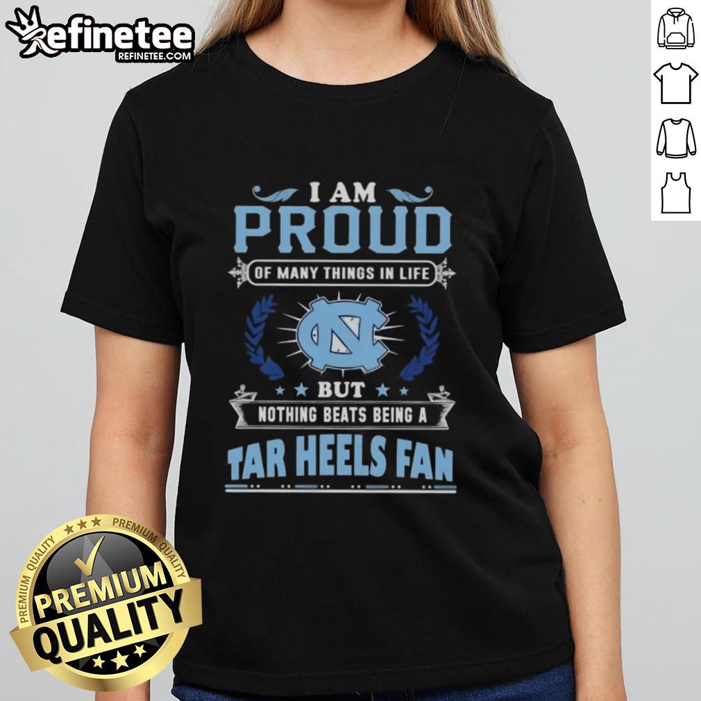 Women's tee featuring 'Proud to be a North Carolina Tar Heels fan' design, perfect for dedicated UNC supporters.