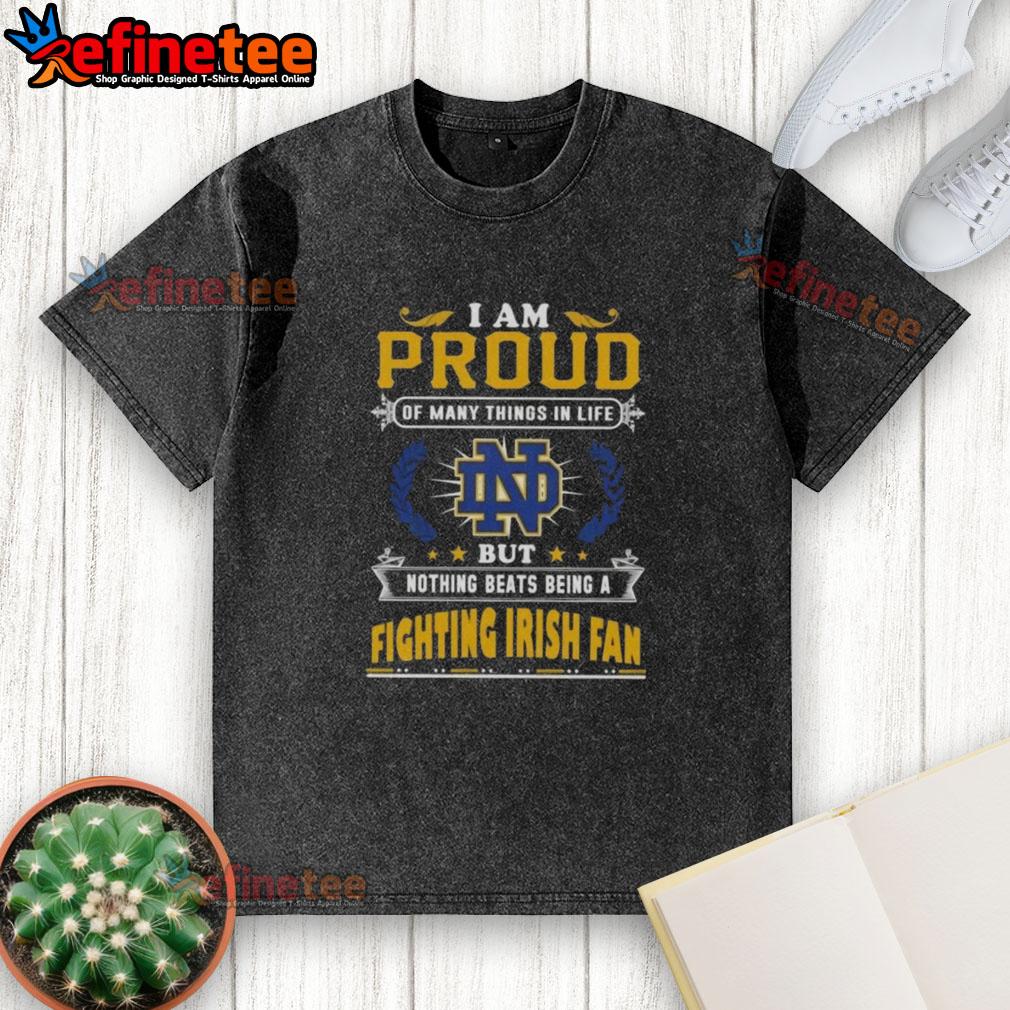 Alt Text: Proud Notre Dame Fighting Irish fan wearing a washed t-shirt showcasing love for the team and its spirit.