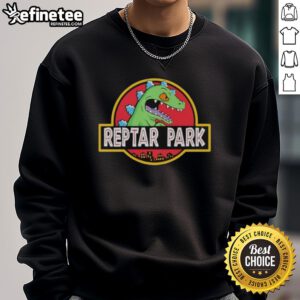Nice Reptar Park Rugrats Movie cartoon sweatshirt featuring vibrant colors and iconic character design for fans.
