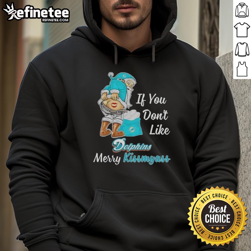 Santa Claus wearing a 'If You Don't Like Miami Dolphins, Merry Kiss My Ass' hoodie, celebrating festive football spirit.