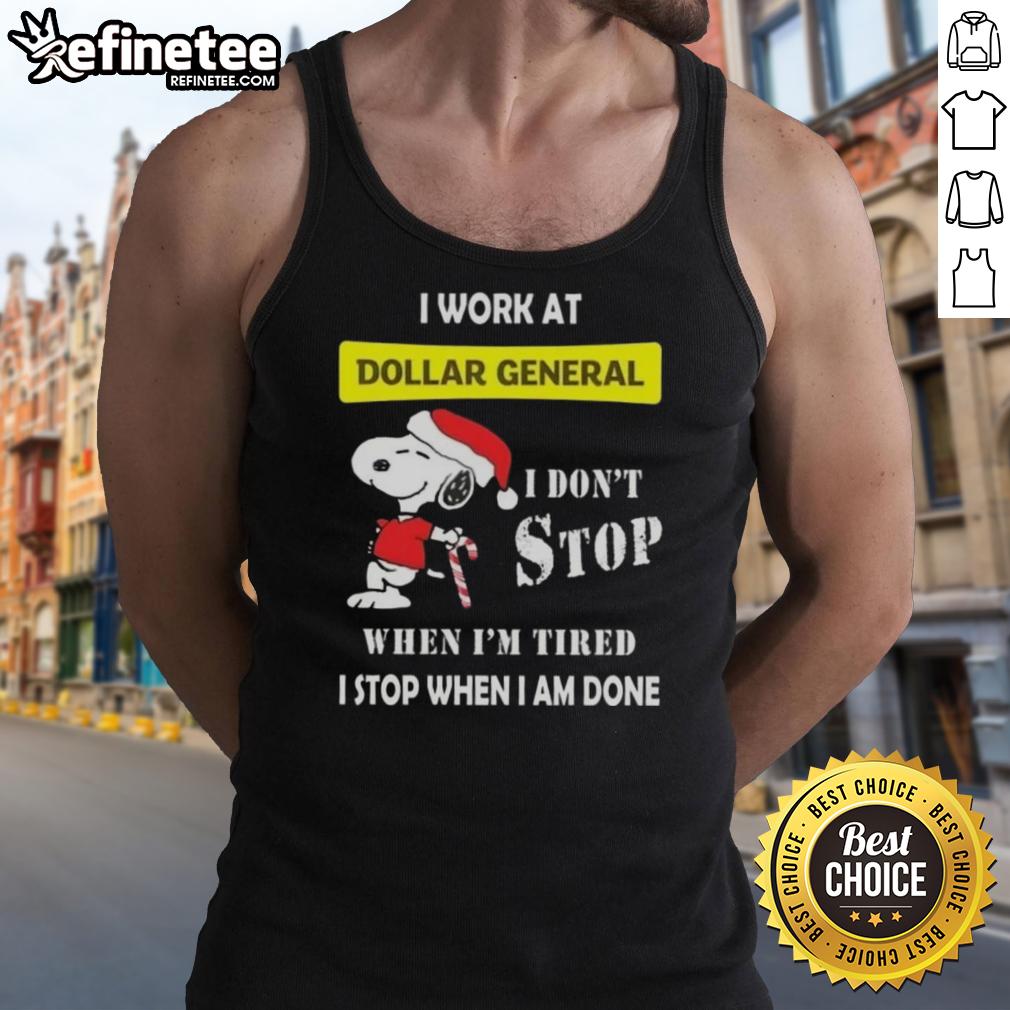 Alt Text: Snoopy Christmas tank top with the phrase 'I work at Dollar General, I dont stop when Im tired, I stop when Im done.'