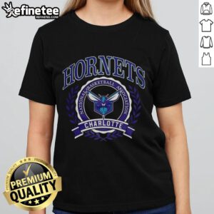 Alt Text: Official Charlotte Hornets NBA logo in a laurel wreath frame on a retro ladies tee, perfect for basketball fans.