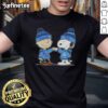 Official Peanuts Charlie Brown fist bump with Snoopy on Tennessee Titans football T-shirt, perfect for fans and collectors.
