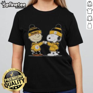 Official Pittsburgh Steelers Snoopy and Charlie Brown Best Friends Ladies Tee featuring iconic characters in team colors.