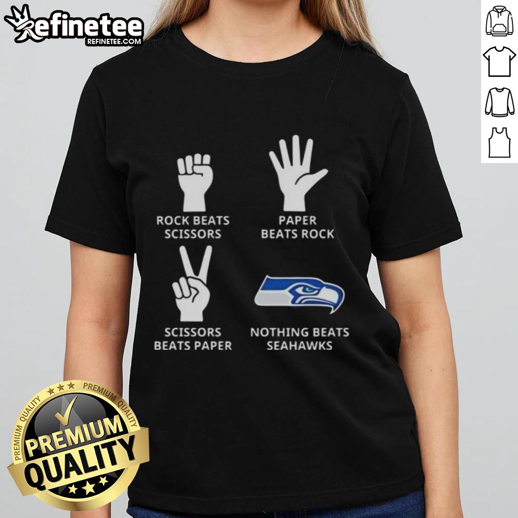 Alt Text: Official Seattle Seahawks ladies tee featuring 'Nothing Beats Rock, Scissors, Paper Beats Rock, Scissors Beats Paper' design.