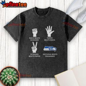 Official Seattle Seahawks t-shirt featuring 'Nothing Beats Rock, Scissors, Paper Beats Rock, Scissors Beats Paper' design.