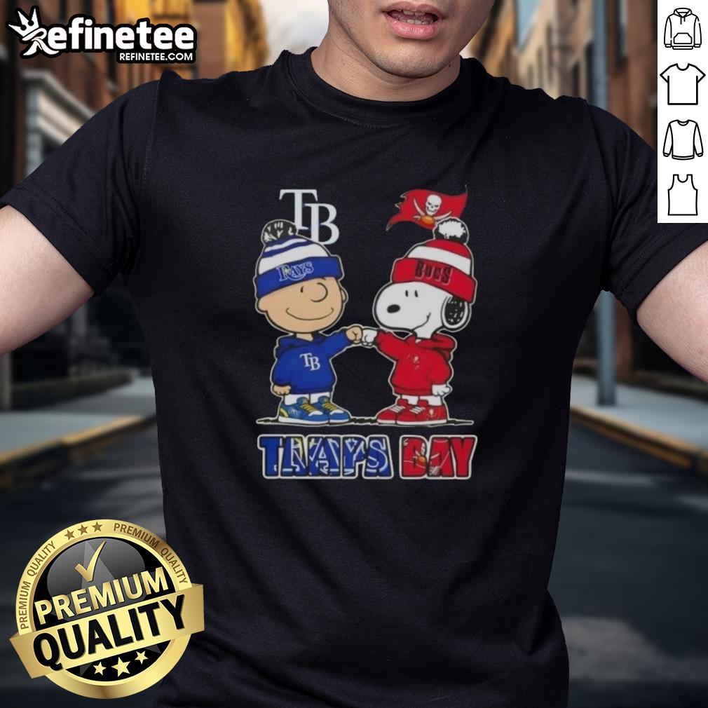 Alt Text: Original Charlie Brown fist bump with Snoopy on a Tampa Bay Rays and Buccaneers T-shirt design.