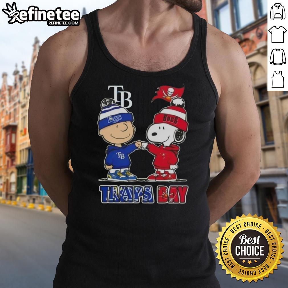 Original Charlie Brown fist bump with Snoopy on Tampa Bay sports tank top featuring Rays and Buccaneers design.