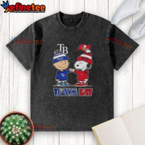 Alt Text: Original Charlie Brown fist bump with Snoopy on a washed t-shirt celebrating Tampa Bay Rays and Buccaneers sports.