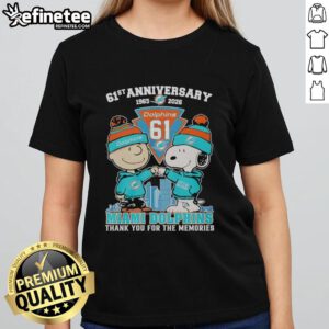 Original Miami Dolphins outfit featuring Snoopy and Charlie Brown, celebrating the 61st anniversary 1965-2026 on ladies' tee.