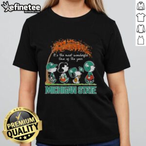 Alt Text: Premium Michigan State Spartans X Peanuts Snoopy and Friends Autumn tee for ladies, perfect for fall celebrations.