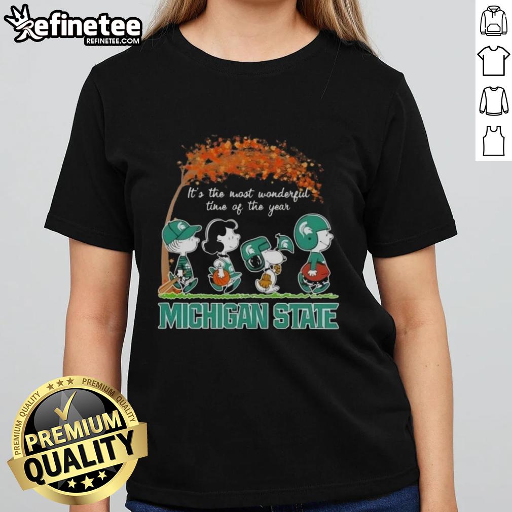 Alt Text: Premium Michigan State Spartans X Peanuts Snoopy and Friends Autumn tee for ladies, perfect for fall celebrations.