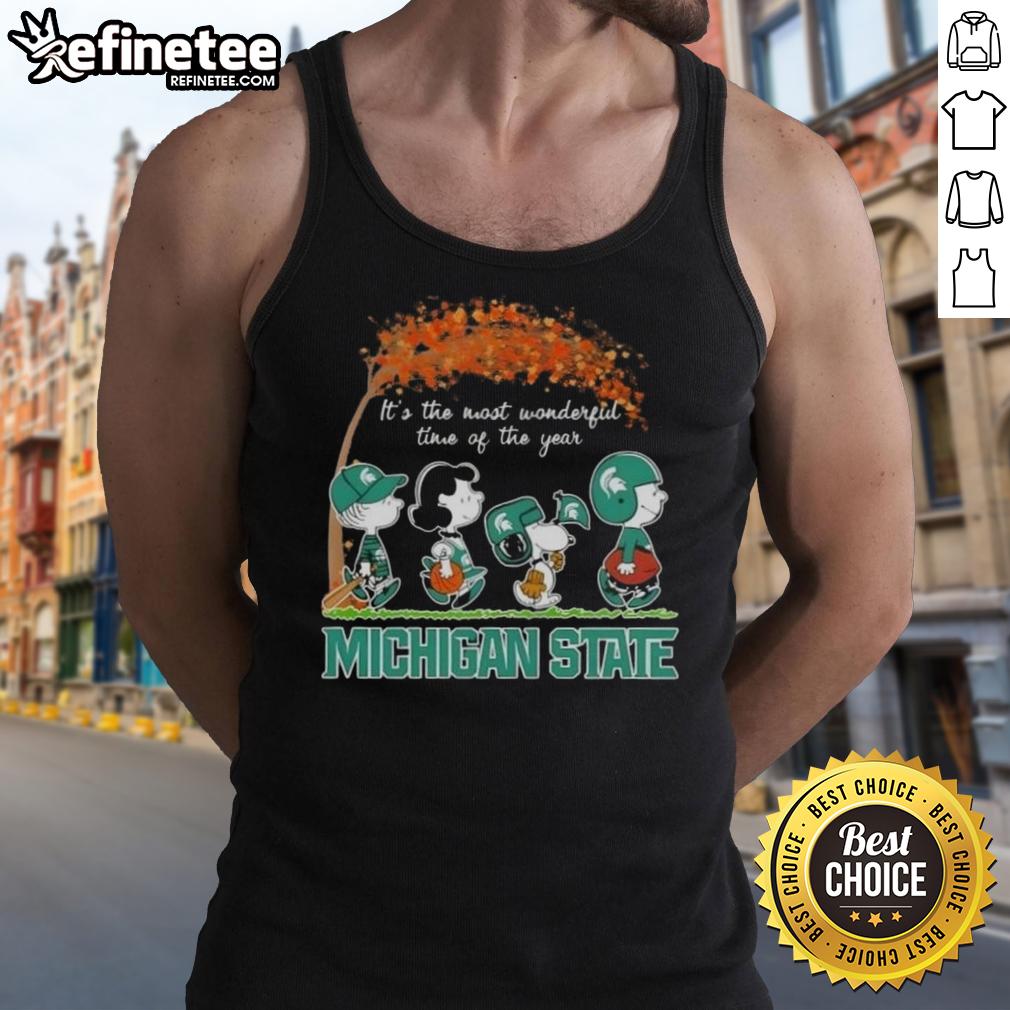 Alt Text: Premium Michigan State Spartans tank top featuring Snoopy and friends celebrating autumn's most wonderful time.