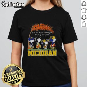 Premium Michigan Wolverines X Peanuts Snoopy and Friends autumn ladies tee celebrating the most wonderful time of the year.