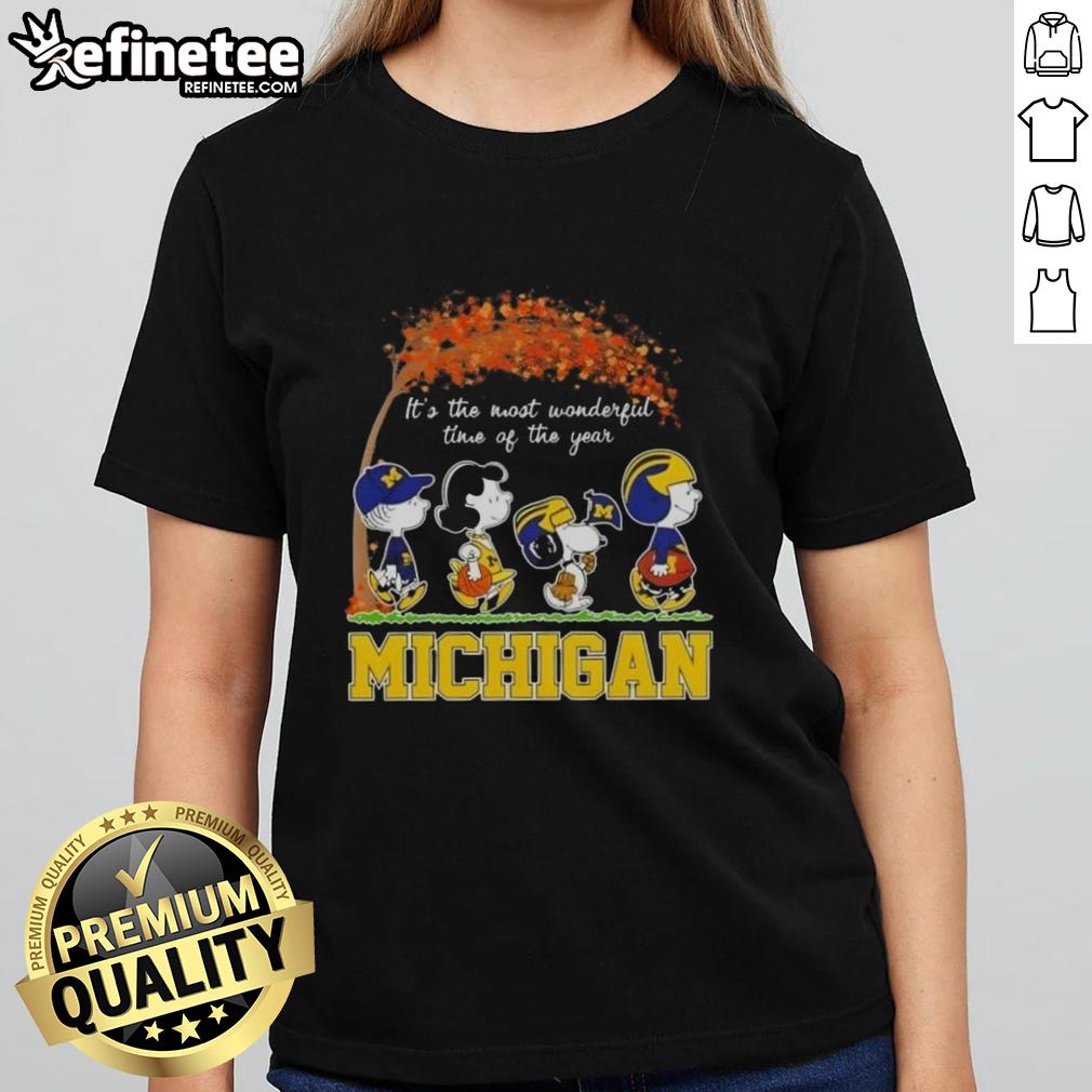 Premium Michigan Wolverines X Peanuts Snoopy and Friends autumn ladies tee celebrating the most wonderful time of the year.