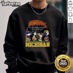 Premium Michigan Wolverines X Peanuts Snoopy and Friends sweatshirt for autumn, celebrating the most wonderful time of the year.