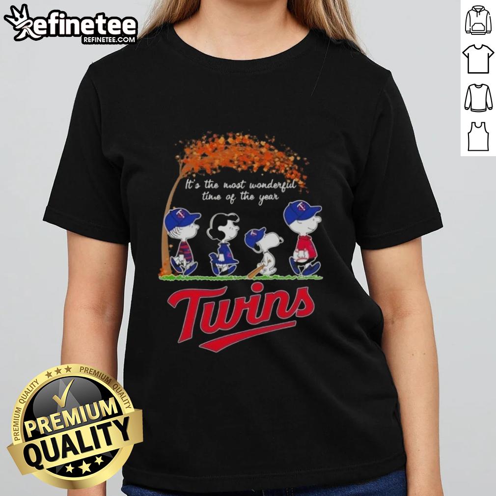 Premium Minnesota Twins X Peanuts tee featuring Snoopy and friends celebrating autumn, perfect for the season.