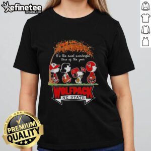 Premium NC State Wolfpack X Peanuts Snoopy and Friends Autumn tee for women, celebrating the most wonderful time of the year.