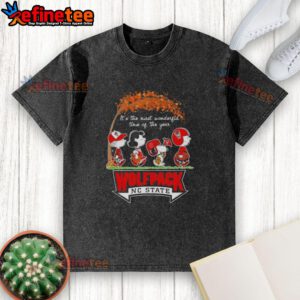 Premium NC State Wolfpack X Peanuts Snoopy autumn t-shirt featuring fun designs, perfect for fall celebrations.