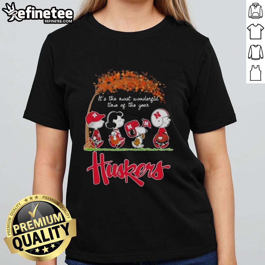 Premium Nebraska Cornhuskers X Peanuts Snoopy tee for ladies celebrating autumn's wonderful season.