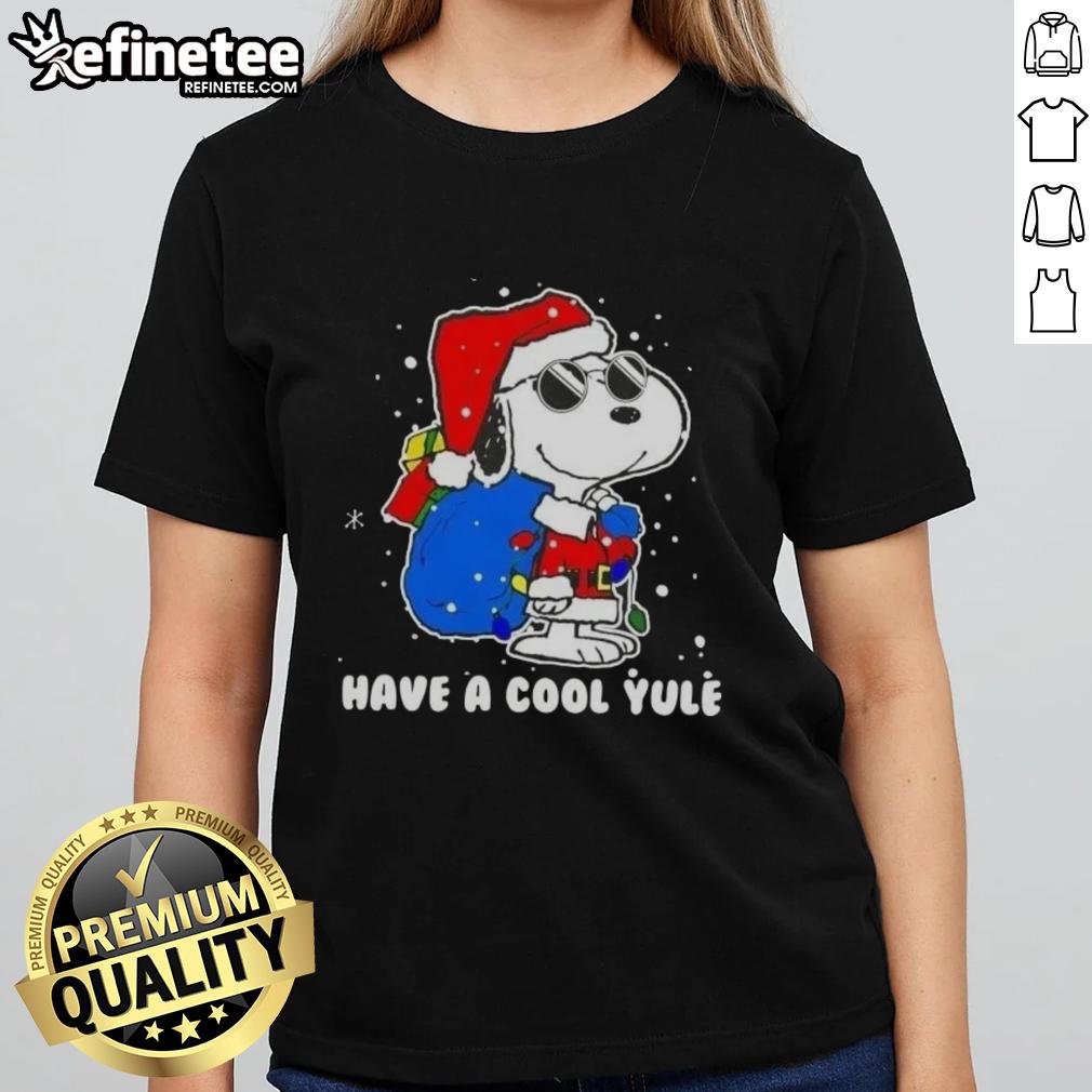 Premium Snoopy Santa Hat tee for women, featuring 'Merry Christmas' and 'Have A Cool Yule' design, perfect for holiday spirit.