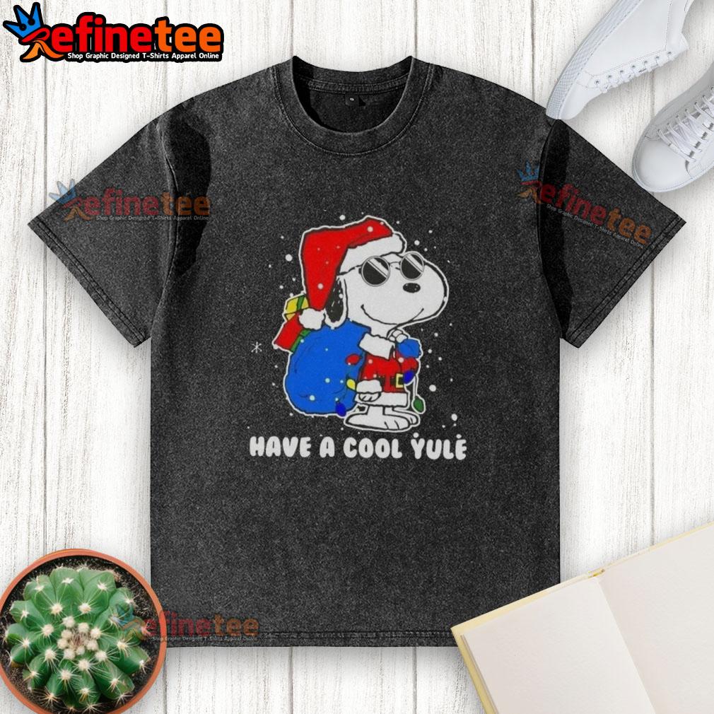 Premium Snoopy Santa Hat Merry Christmas t-shirt featuring festive design for a cool yule holiday spirit.