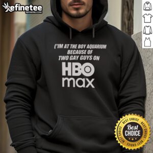 Two guys in HBO Max hoodies at an aquarium, enjoying the vibrant marine life and capturing the moment together.