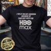 Man wearing 'Nice I'M At The Boy Aquarium Because Of Two Guys' HBO Max T-shirt, standing in front of an aquarium.