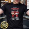 Alt Text: Snoopy in a hoodie smiling at fans, wearing an Atlanta Falcons X-Design T-shirt, perfect for Peanut lovers.