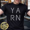 Alt Text: Official Y A R N Logo T-Shirt featuring a stylish design and vibrant colors, perfect for yarn enthusiasts and crafters.