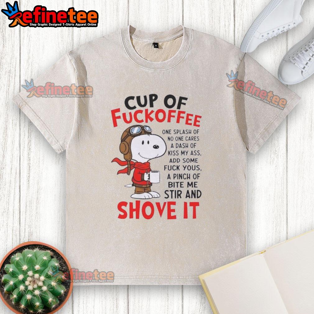 Alt Text: Snoopy coffee cup graphic on a humorous washed t-shirt with cheeky text and playful design elements.