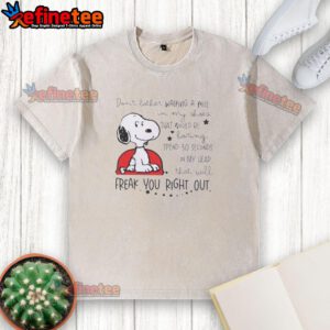 Alt Text: Snoopy walking in my shoes on a washed t-shirt, capturing the quirky phrase about thoughts and imagination.