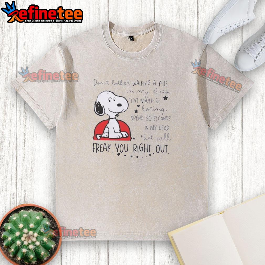 Alt Text: Snoopy walking in my shoes on a washed t-shirt, capturing the quirky phrase about thoughts and imagination.