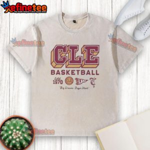 Alt Text: Official CLE Basketball Est 1970 Big Dream Bigger Heart logo on a washed t-shirt, perfect for fans and players.