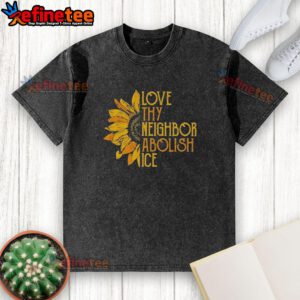 Pretty Love Thy Neighbor Abolish ICE Sunflower washed t-shirt featuring a vibrant sunflower design on a soft fabric.