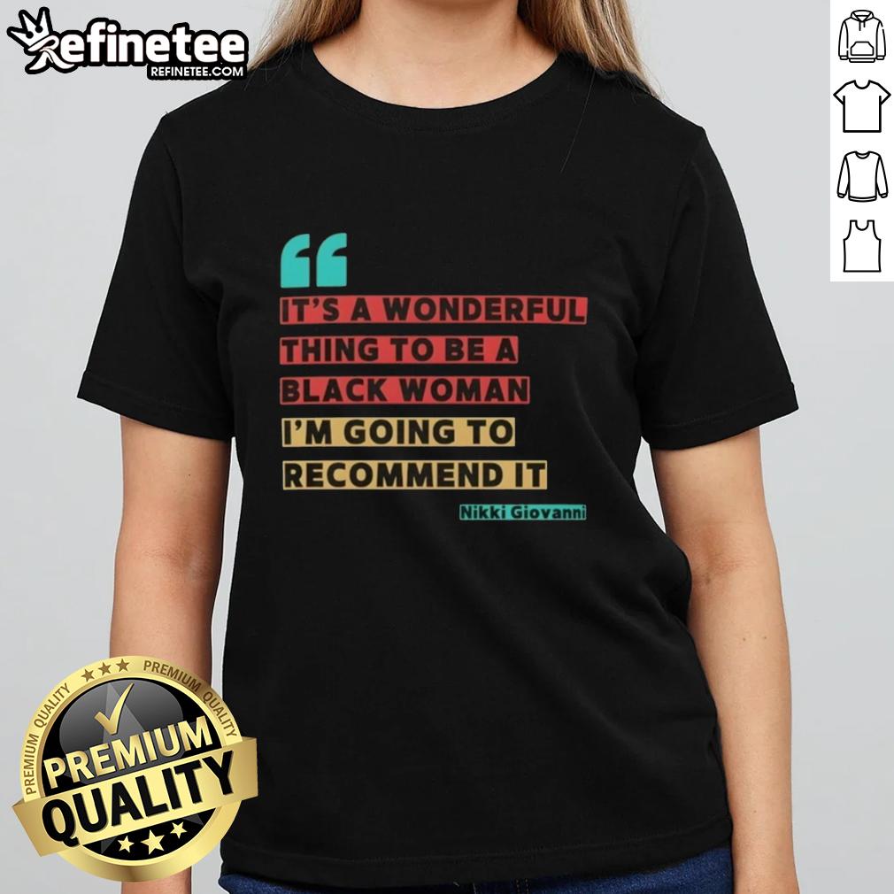 Alt Text: Black woman wearing 'It's A Wonderful Thing To Be A Black Woman' tee by Nikki Giovanni, showcasing empowerment and pride.