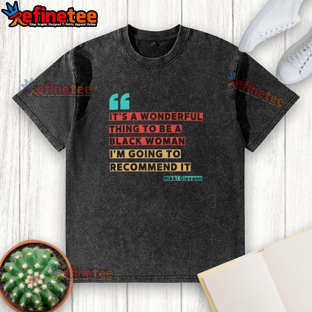 Alt Text: Black woman wearing a It's a Wonderful Thing to Be a Black Woman Nikki Giovanni washed t-shirt, celebrating empowerment.