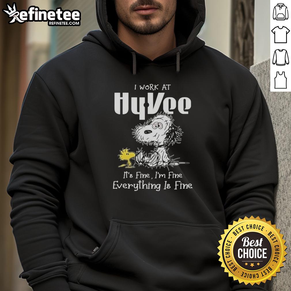 Hot and tired Snoopy wearing a 'I Work at Hy-Vee, It's Fine, I'm Fine, Everything is Fine' hoodie.