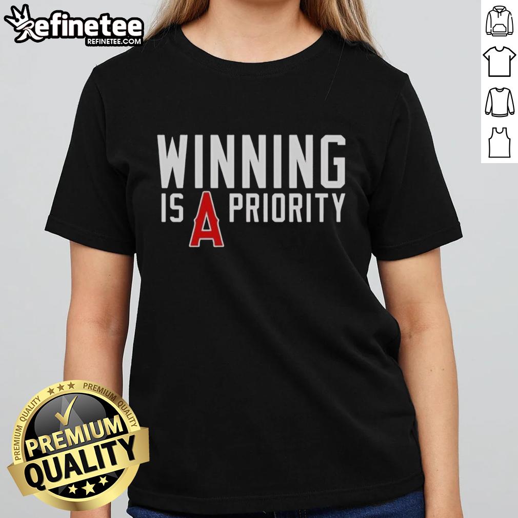 Original Los Angeles Angels Winning is Angels Priority Ladies Tee showcasing team pride and stylish comfort.